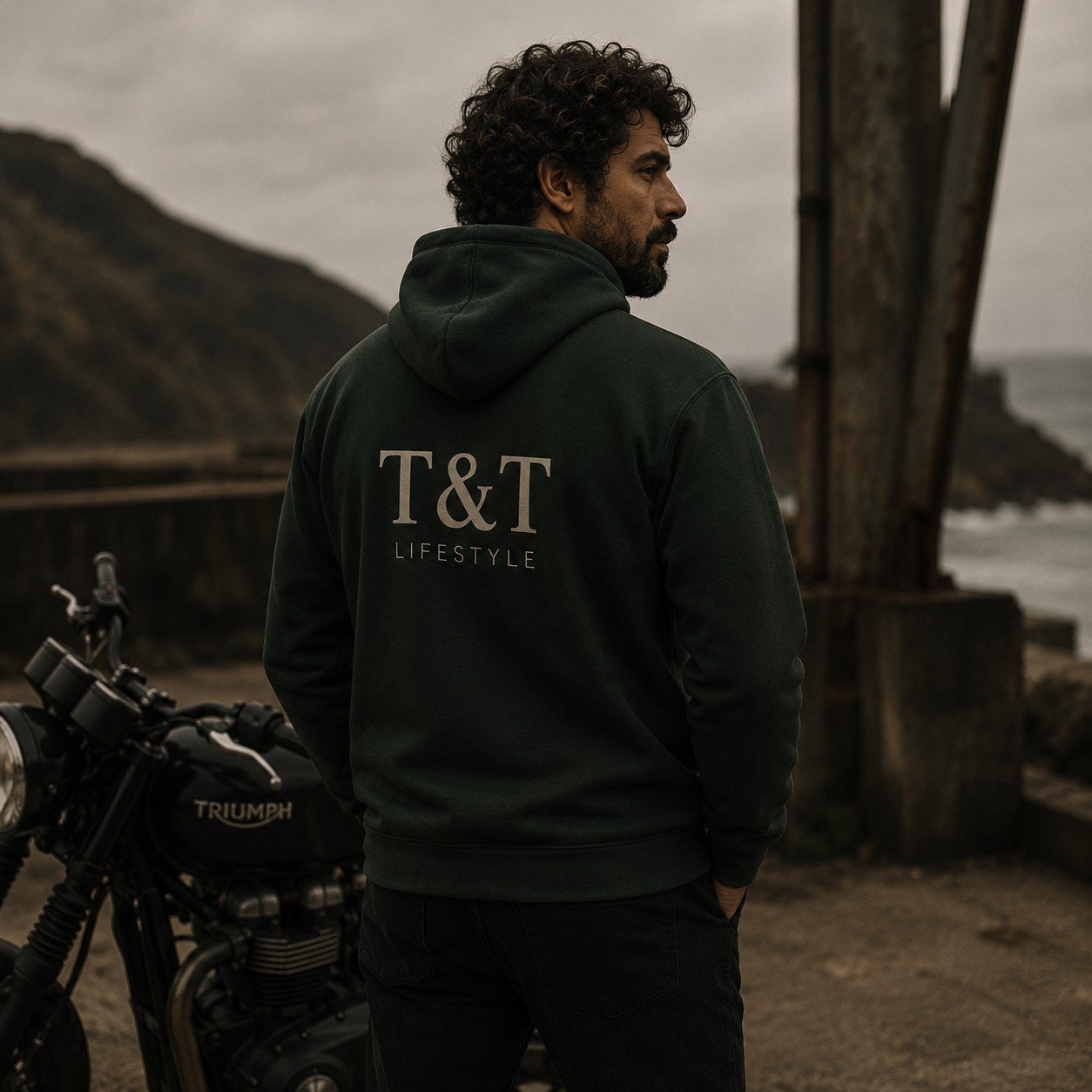 Dark hoodie with Tork and Tailor mark